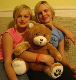 Two girls with Tappy Bear