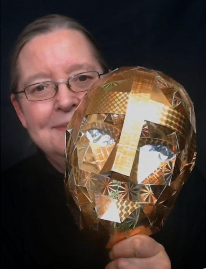 Silvia Hartmann 2022 with golden robot mask