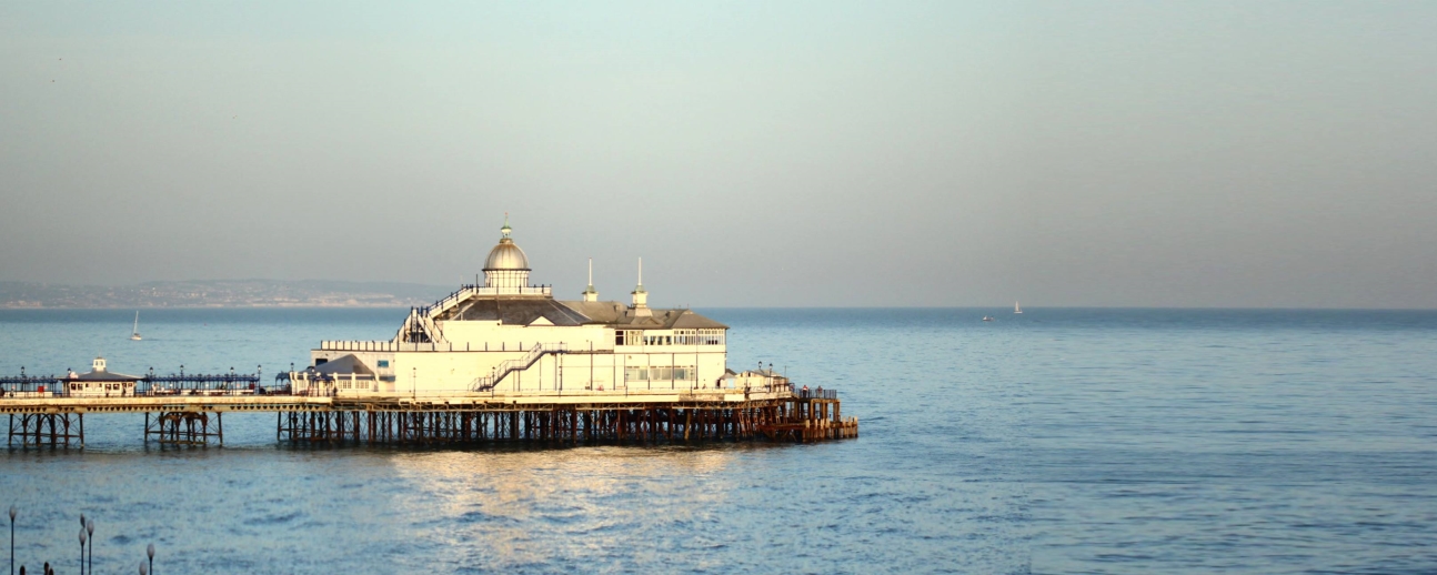 Eastbourne Pier and sea in the afternoon sun by Silvia Hartmann.